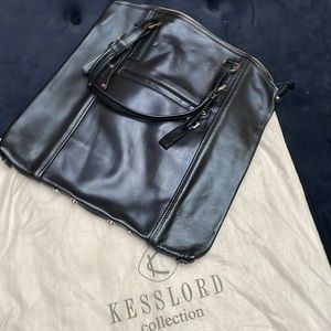 Beautiful navy blue Kesslord Collection handbag.